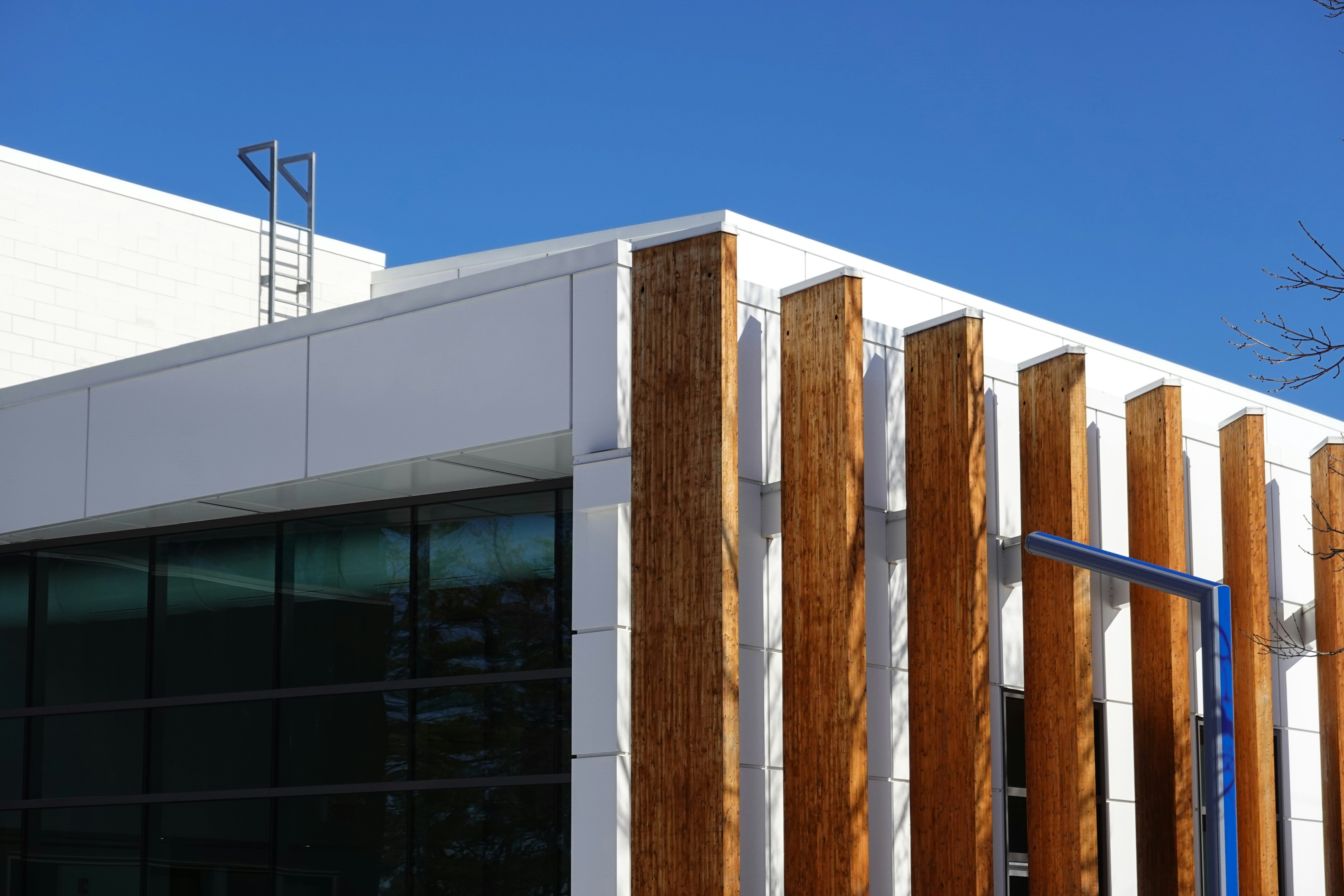 brown wooden fence near building during daytime